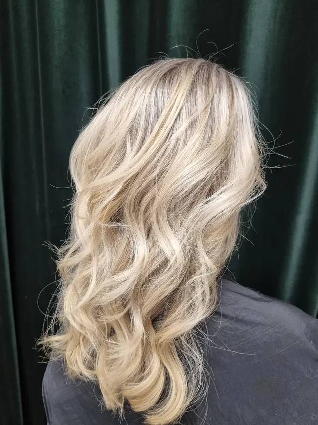 Blonde balayage waves, styled at Indigo